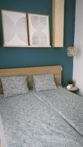 Ένα ή περισσότερα κρεβάτια σε δωμάτιο στο Modern új lakás a belvárosban