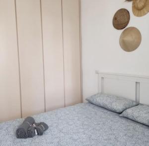 Un pat sau paturi într-o cameră la Maison Leon