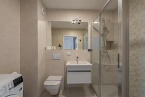 Kúpeľňa v ubytovaní Horyzont Apartamenty - Kapitański Mostek- BLISKO PORTU- Śniadania