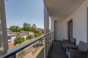 Balkón alebo terasa v ubytovaní Horyzont Apartamenty - Kapitański Mostek- BLISKO PORTU- Śniadania