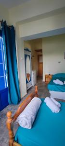 Cama o camas de una habitación en Milisia Rooms