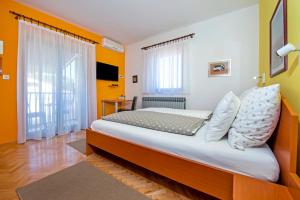 Postel nebo postele na pokoji v ubytování Apartments Erik B&B Adults only
