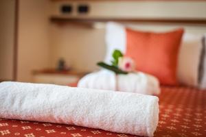 Posteľ alebo postele v izbe v ubytovaní Hotel Excelsior