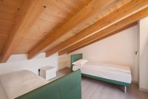 Postel nebo postele na pokoji v ubytování Il Frantoio a Monte-vicino al lago