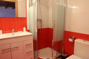 a bathroom with a shower and a sink at Landazelaia in Garzáin +13 photos