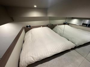 Voodi või voodid majutusasutuse grandir ｸﾞﾗﾝﾃﾞｨｰﾙ-Adult Only- toas