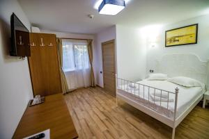 Postel nebo postele na pokoji v ubytování Casa Ypu