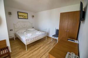 Postel nebo postele na pokoji v ubytování Casa Ypu