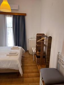 Postel nebo postele na pokoji v ubytování Sifnos Valley