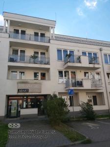 Budova, v ktorej sa apartmán nachádza + 22 fotografií