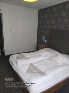 Posteľ alebo postele v izbe v ubytovaní Plage apartman