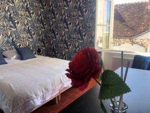 Ένα ή περισσότερα κρεβάτια σε δωμάτιο στο la maison Haute