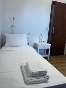 Postel nebo postele na pokoji v ubytování Sifnos Valley