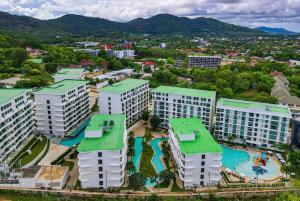 an aerial view of a resort with a water park at Wyndham La Vita Rawai Phuket in Rawai Beach