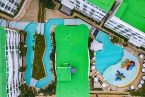 an overhead view of a swimming pool in a city at Wyndham La Vita Rawai Phuket in Rawai Beach