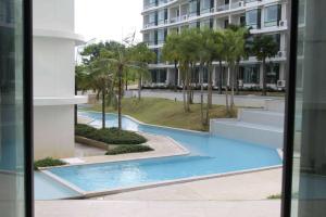 a view of a swimming pool in a building at Wyndham La Vita Rawai Phuket in Rawai Beach