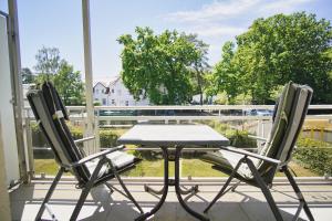 Balkón nebo terasa v ubytování strandnahe Ferienwohnung mit 2 Balkonen - Haus am Kurpark FeWo 12