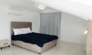 Postel nebo postele na pokoji v ubytování Vira Villas