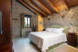 Säng eller sängar i ett rum på Villa Torre Delle Rose