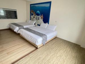 Een bed of bedden in een kamer bij Meet ‧ Happiness B&B