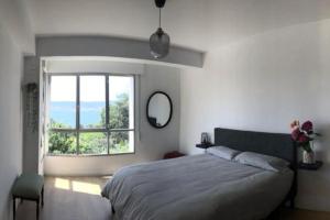 Posteľ alebo postele v izbe v ubytovaní Vistas al mar y barbacoa