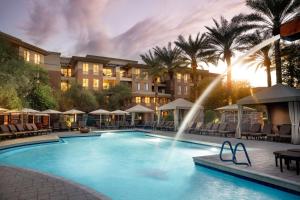 a pool at a hotel with a fountain at The Westin Kierland Villas, Scottsdale in Scottsdale