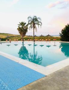 The swimming pool at or close to Kodra e Godenve