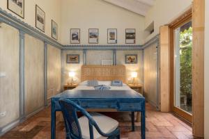 A bed or beds in a room at La Cucchetta