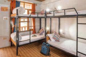Postel nebo postele na pokoji v ubytování Zostel Spiti