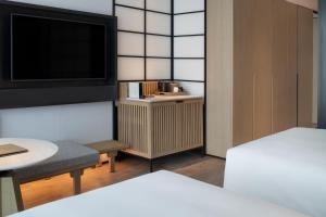 Postel nebo postele na pokoji v ubytování Sheraton Xi'an Chanba