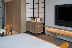 Postel nebo postele na pokoji v ubytování Sheraton Xi'an Chanba