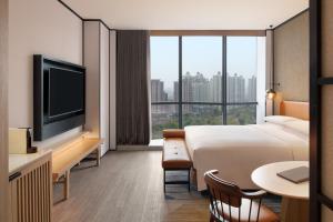 TV a/nebo společenská místnost v ubytování Sheraton Xi'an Chanba
