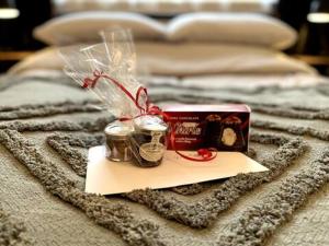 a pile of christmas items on top of a bed at Fourwinds in Maldon