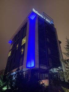 a building with a blue light on the side of it at On4 Rooms & Suites in Istanbul