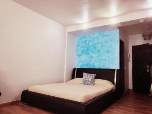 Postel nebo postele na pokoji v ubytování LOFT PARAISO + 12 fotografií