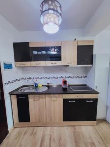Kuchyň nebo kuchyňský kout v ubytování LOFT PARAISO