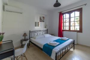 Postel nebo postele na pokoji v ubytování A&S Seaside House