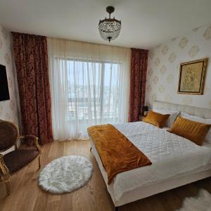 Ένα ή περισσότερα κρεβάτια σε δωμάτιο στο Belgrade Waterfront 1409