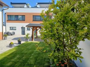 Ogród w obiekcie PENTHOUSE Griemann 1 mit Infrarotkabine und eigener Dachterrasse für max 4 Personen