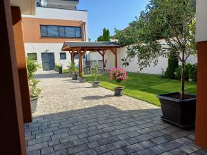 Ogród w obiekcie PENTHOUSE Griemann 1 mit Infrarotkabine und eigener Dachterrasse für max 4 Personen