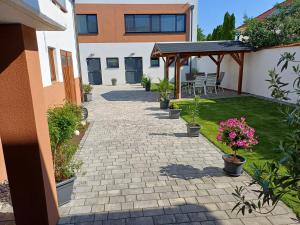 Ogród w obiekcie PENTHOUSE Griemann 1 mit Infrarotkabine und eigener Dachterrasse für max 4 Personen