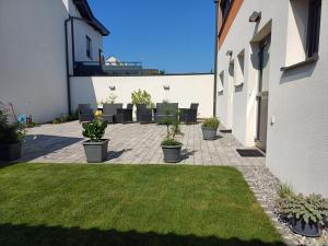 Ogród w obiekcie PENTHOUSE Griemann 1 mit Infrarotkabine und eigener Dachterrasse für max 4 Personen