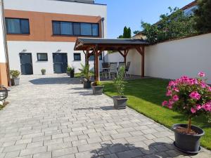 Ogród w obiekcie PENTHOUSE Griemann 1 mit Infrarotkabine und eigener Dachterrasse für max 4 Personen