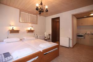 A bed or beds in a room at Villa Milma
