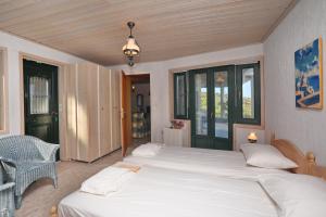 A bed or beds in a room at Villa Milma