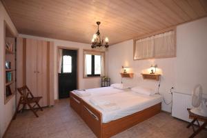 A bed or beds in a room at Villa Milma