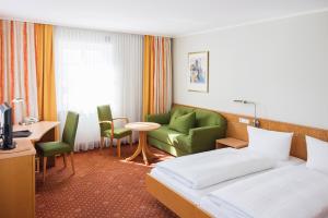 Postel nebo postele na pokoji v ubytování Hotel Rad