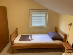 Postel nebo postele na pokoji v ubytování Hostel Jedvaj
