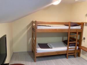 Postel nebo postele na pokoji v ubytování Hostel Jedvaj