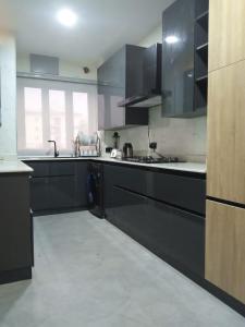 A kitchen or kitchenette at The Vistana Riverside 2Bedroom Apartment